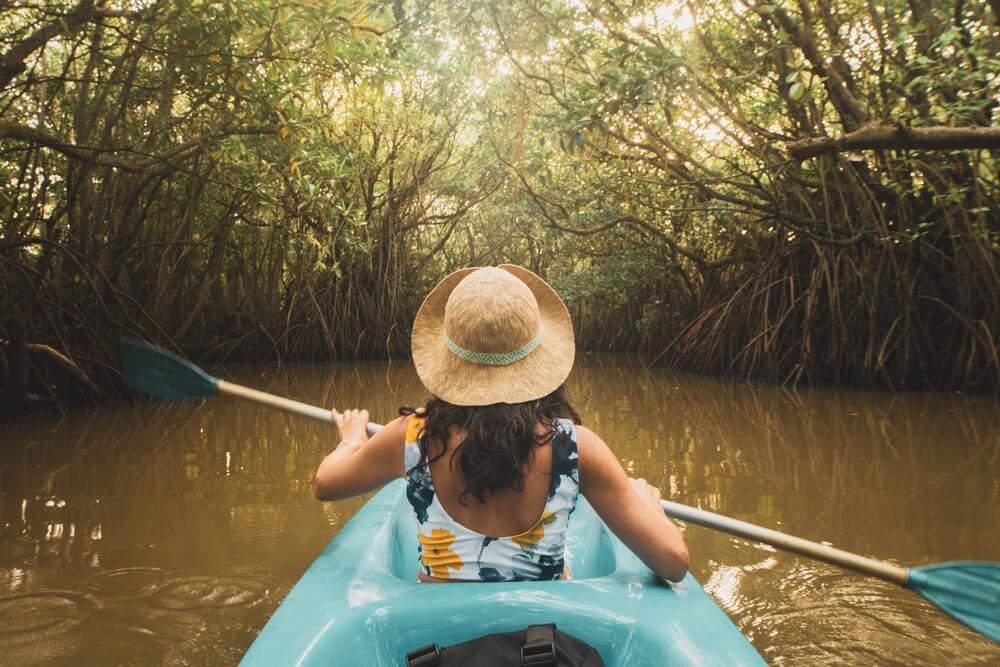 A woman kayaking in Florida.